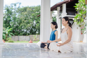 Participants meditating at the altar at Amrita complex