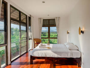 Bright deluxe room with natural light and scenic view